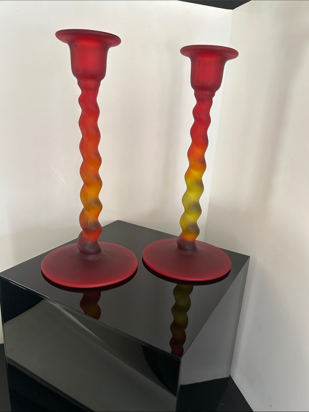 Pair of Red and Yellow Swirl Glass Candlesticks